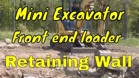 mini excavator rock wall|Building Terrace retaing wall with mini excavator and tractor.